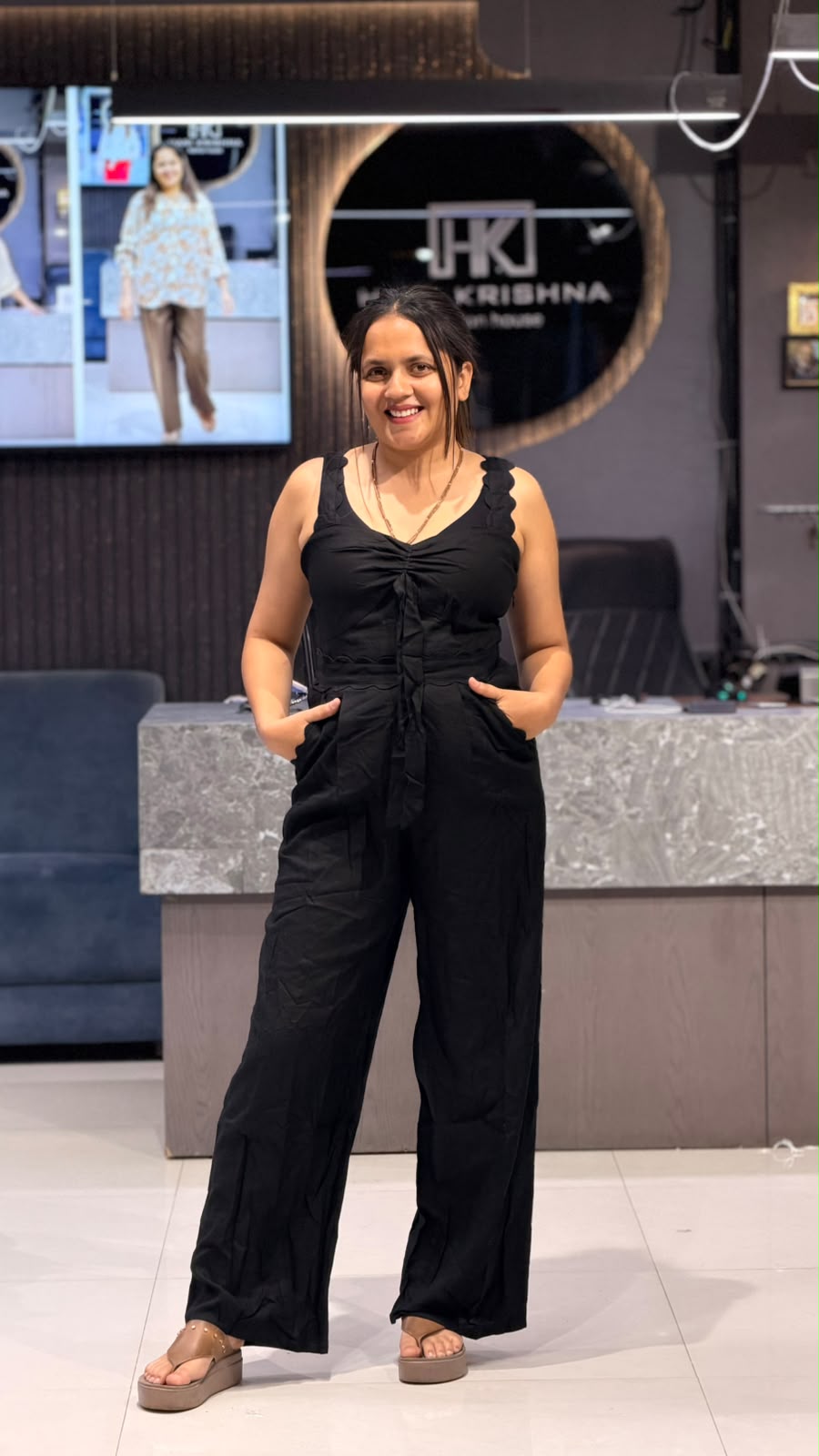 SLEEVELESS DRAWSTRING WAIST WIDE-LEG JUMPSUIT