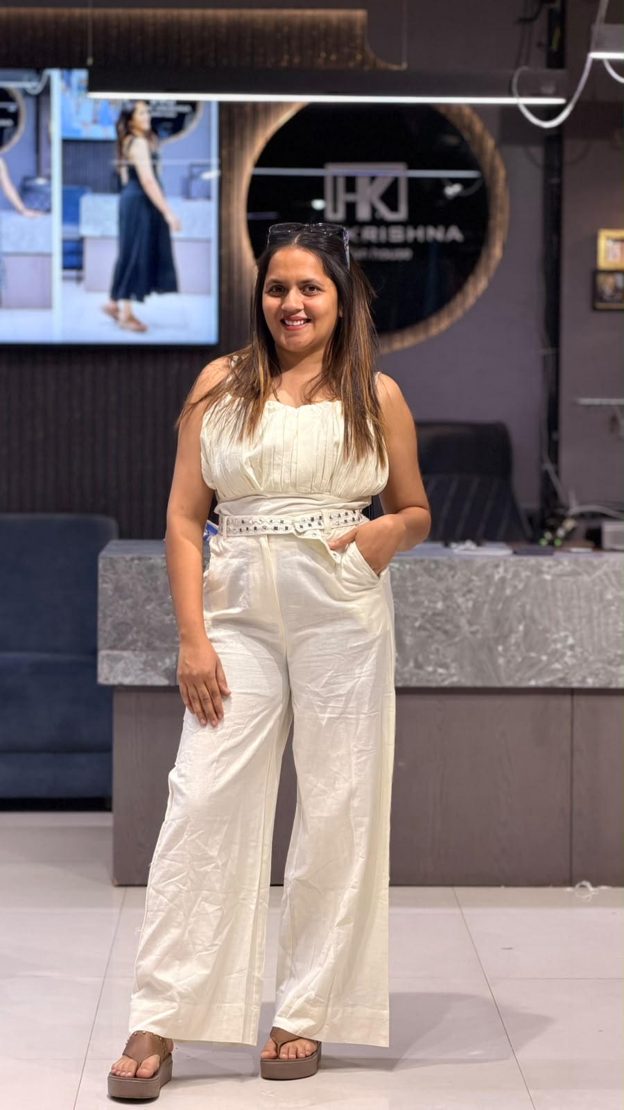 SLEEVELESS WAIST BELT WIDE-LEG JUMPSUIT